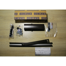 Дверний доводчик GEZE TS 1500 G з ковзною шиною з фіксацією, коричневий