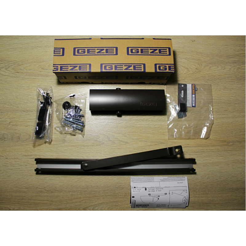 Дверний доводчик GEZE TS 1500 G з ковзною шиною з фіксацією, коричневий